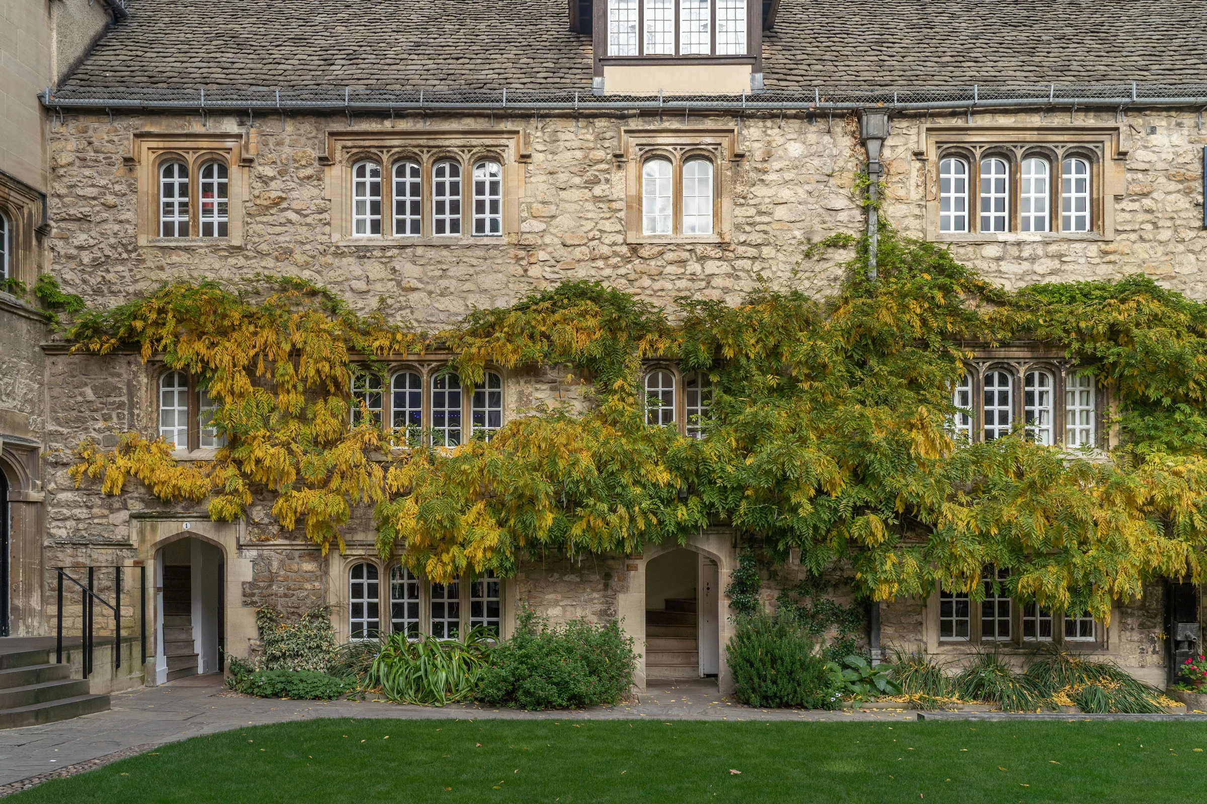 Traditional stone facade and sash windows of a historic Oxford building